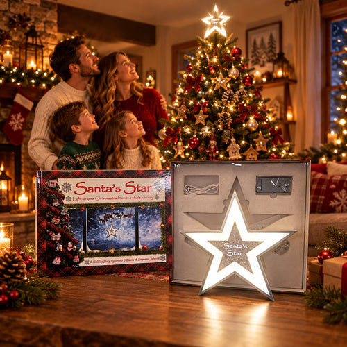 Star-shaped light in packaging with 'Santa's Star' branding on a wooden surface.